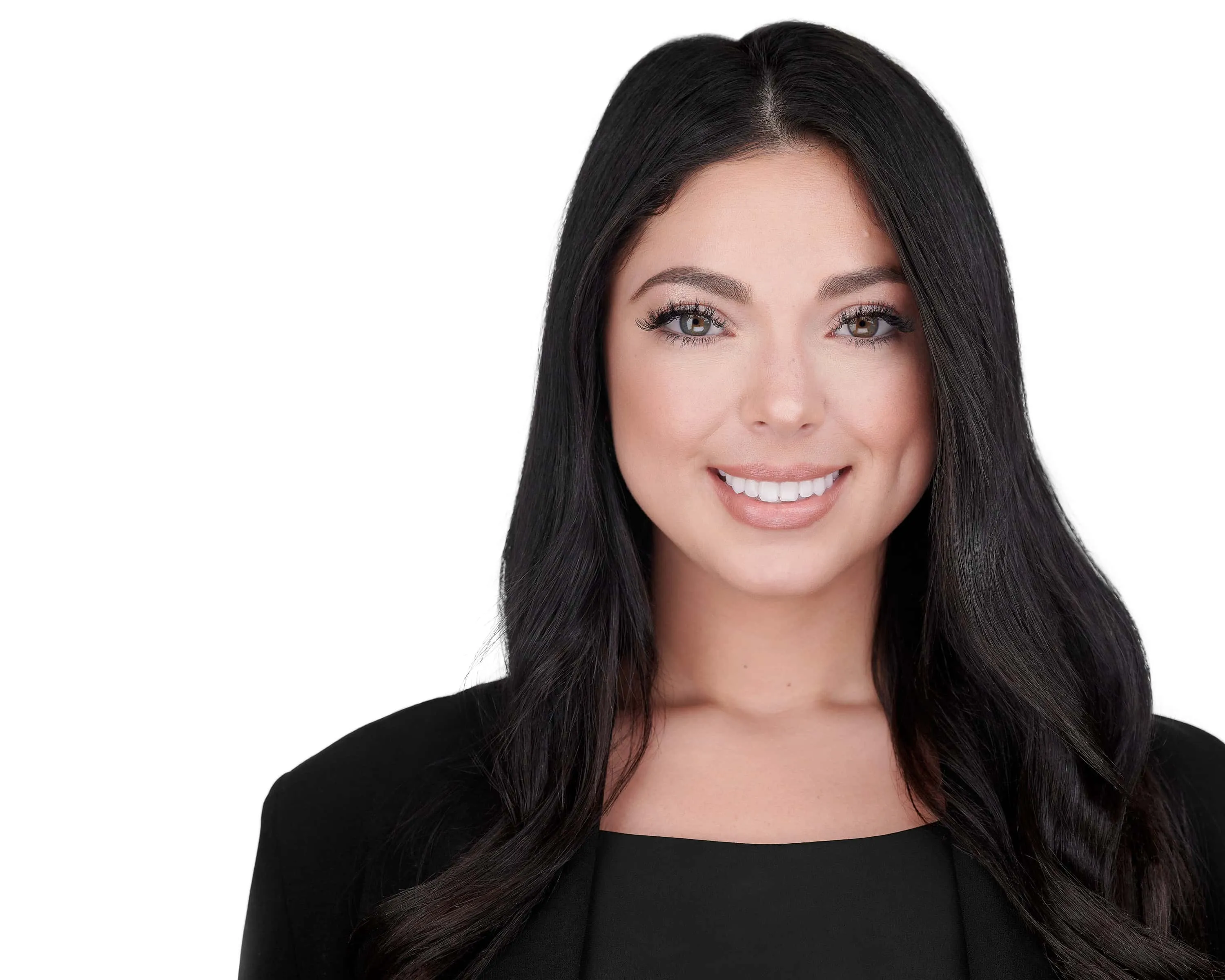 Professional headshot of female with long straight black hair, wearing black blazer over black top, bright white smile showing teeth, photographed on seamless white background by Lancaster Pennsylvania headshot photographer Richard Waine