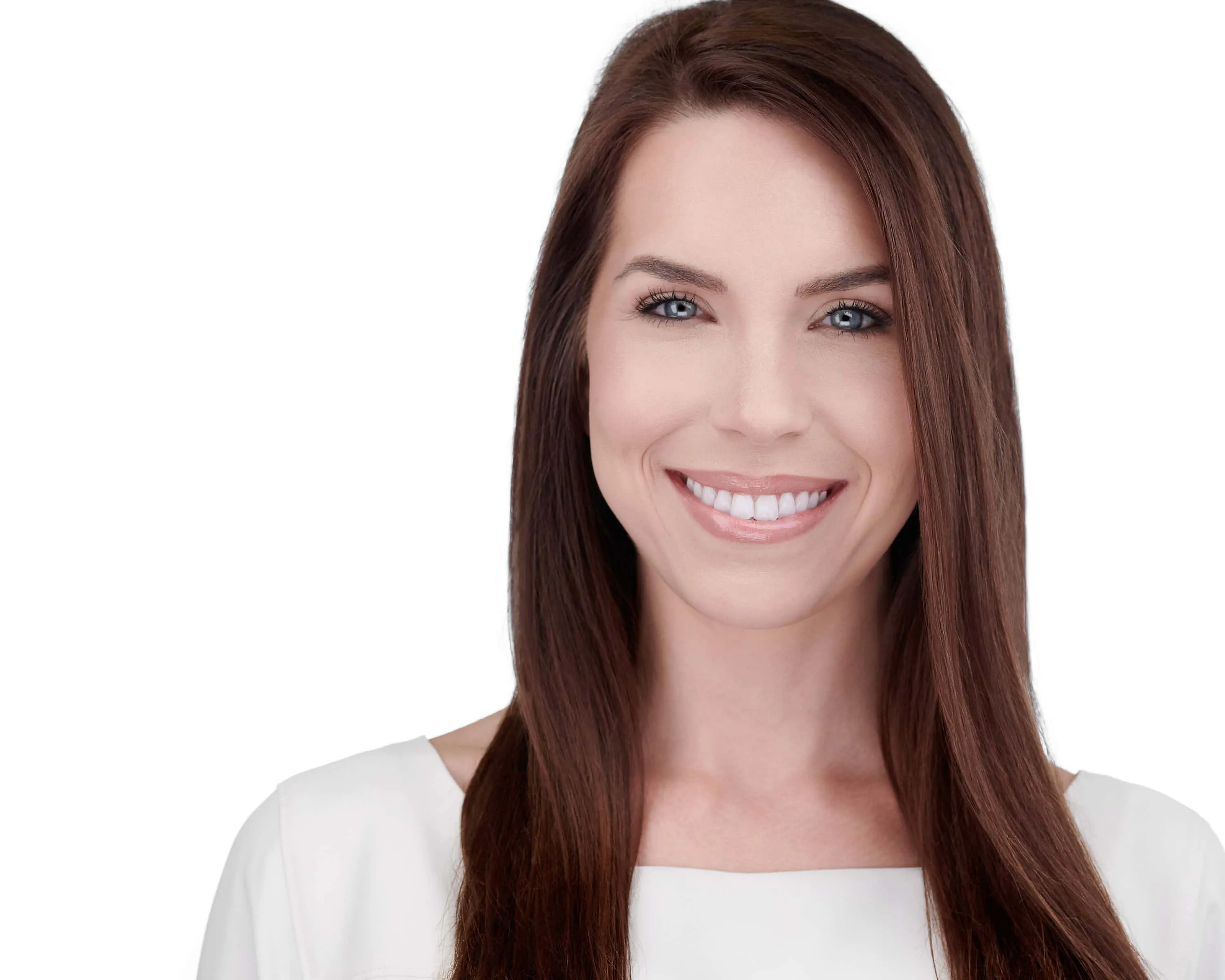Professional headshot of female with long straight brown hair, bright white smile showing teeth, wearing white top, photographed on seamless white background in Lancaster, Pennsylvania by headshot photographer Richard Waine