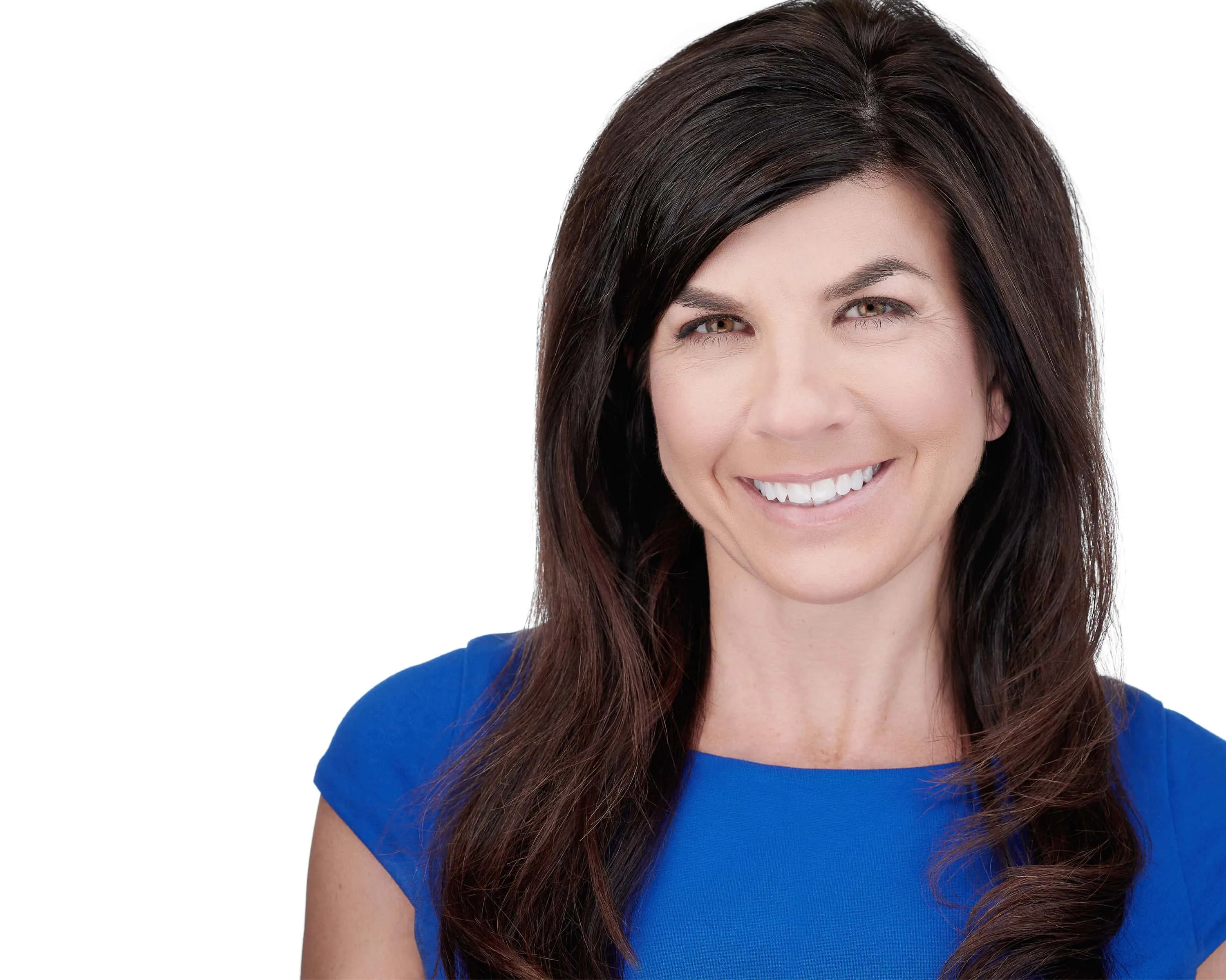 Professional corporate headshot of Caucasian woman with long flowing dark brown hair with side part swept over shoulders wearing royal blue sleeveless top with warm approachable expression showing natural teeth photographed against seamless white background with professional high-key lighting by Richard Waine Photography Lancaster Pennsylvania