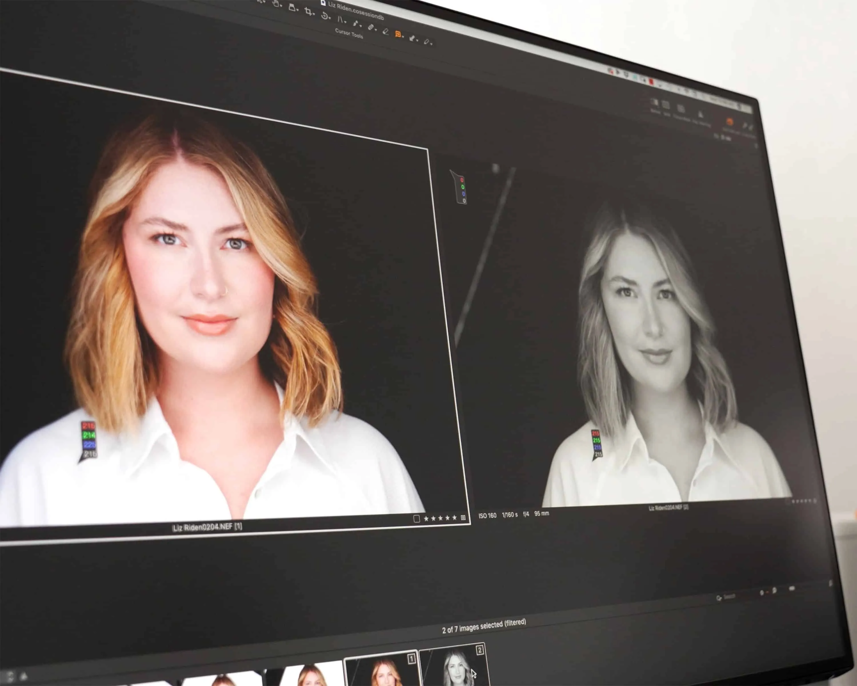 Dual monitor tethered photography workflow displaying side-by-side comparison of color portrait and monochrome conversion of woman with shoulder-length wavy blonde hair wearing white collared shirt using professional photo editing software at Richard Waine Photography Lancaster Pennsylvania studio